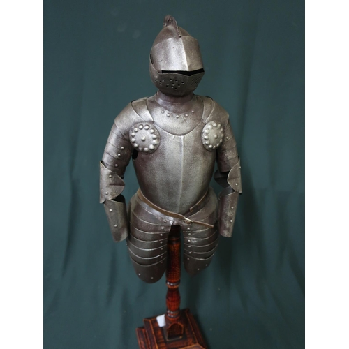 63 - Ornamental metal half suit of armor mounted on wooden plinth H56cm