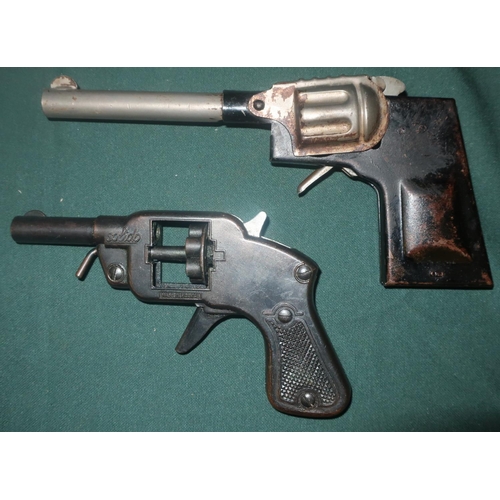 61 - Two Vintage tin toy cap guns (2)