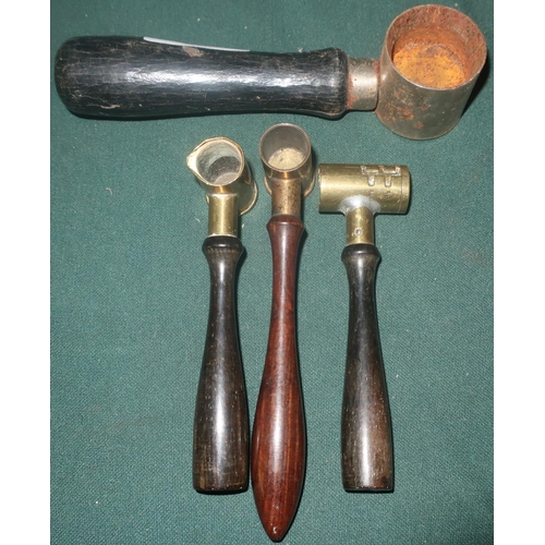 184 - Set of 3 brass powder measures and a large 
stainless steel measure (4)