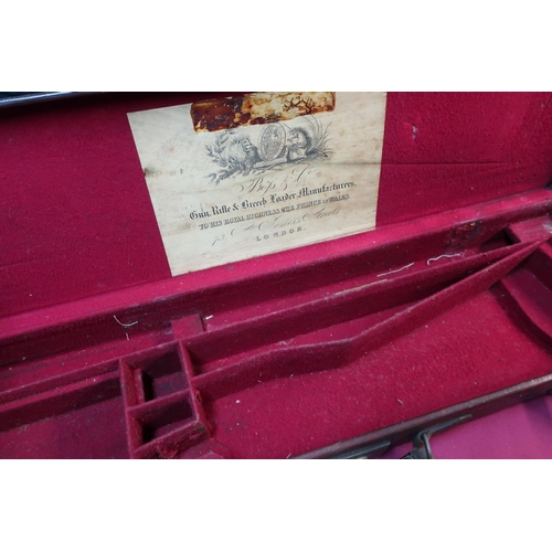 224 - Vintage leather gun case with red base fitted interior to fit up to 30inch barrels with trade label ... 