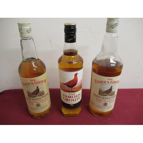 145 - The Famous Grouse Finest Scotch Whisky 1ltr 43%vol, (low level), two similar 75cl & 70cl both 40%vol... 