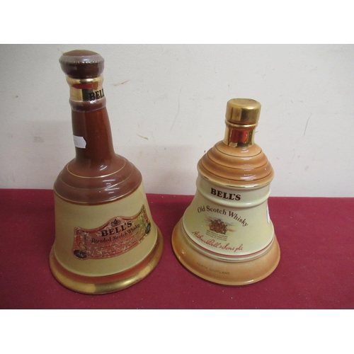 147 - Bell's Old Scotch Whisky, 75cl 43%vol, similar 70cl 40%vol, both in Wade decanters, (2)