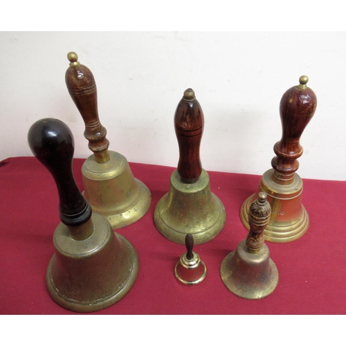 82 - Town Criers hand bell with turned rosewood handle H26.5cm, four other hand bells, former property of... 
