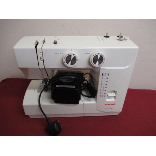 96 - Janome electric sewing machine with foot pedal in carry bag