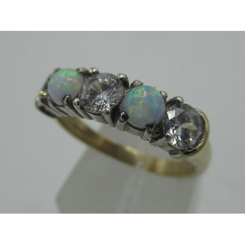 133 - 9ct gold hallmarked white stone and opal ring, boxed