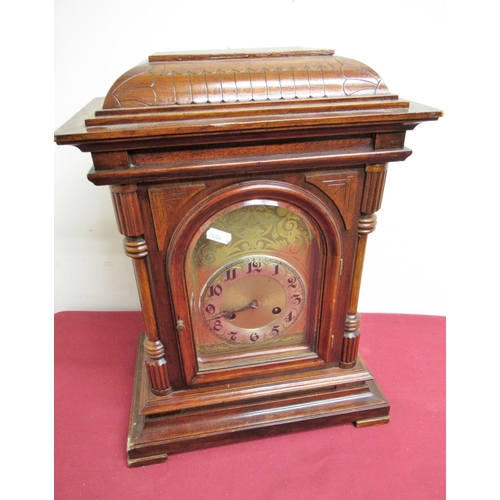 26 - Early 20th C mahogany cased mantel clock, architectural case with engraved arched brass dial and sil... 