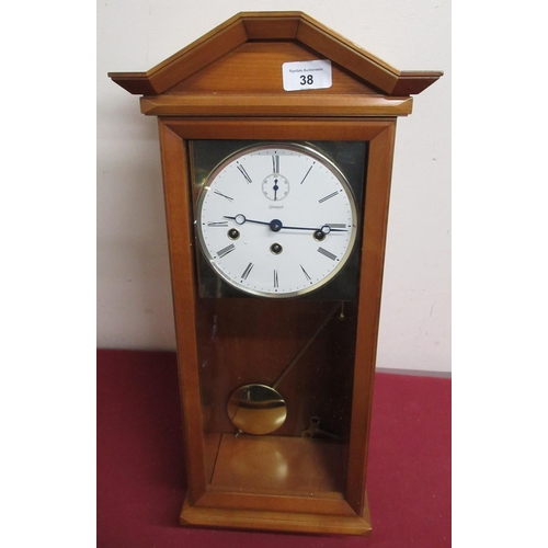 38 - 20th C Kieniger Wall clock, sycamore coloured case with glazed panelled door enclosing square brass ... 