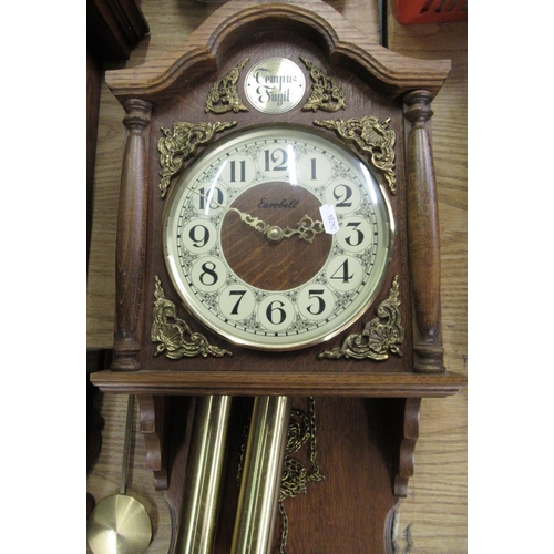 43 - Late 20th C Eurobell wall clock, oak case with carved and half turned pillars and applied bass spand... 