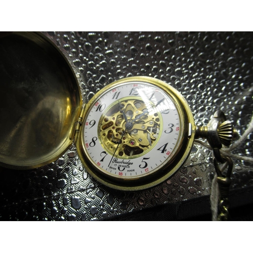 75 - Swiss, retailed by W Rusbridge of Scarborough, gold plated hunter pocket watch, skeletonised movemen... 