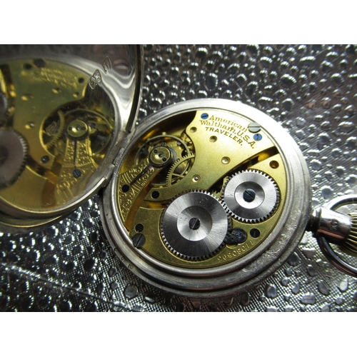 78 - Waltham Traveller silver cased half hunter pocket watch. white enamel dial marked A.W. W Co. Waltham... 
