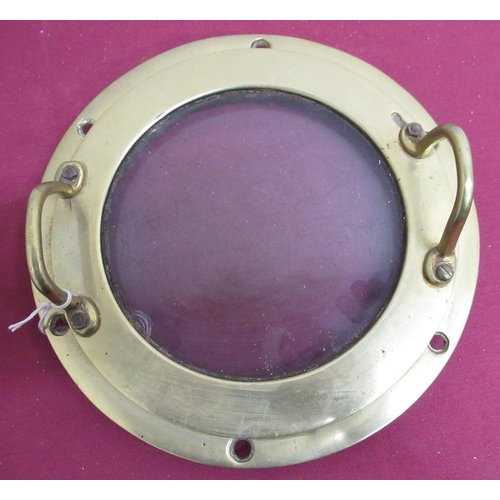 155 - 20th C brass circular porthole, with two handled screw cover, D23cm