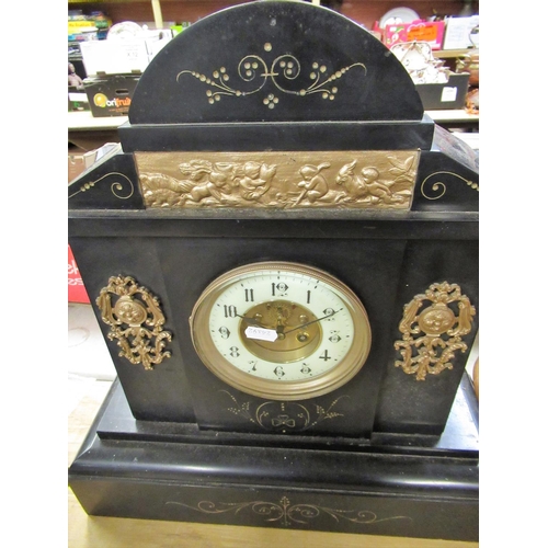 67 - 19th C French slate cased mantel clock with gilt metal mounts and panel decorated with puttie, two t... 