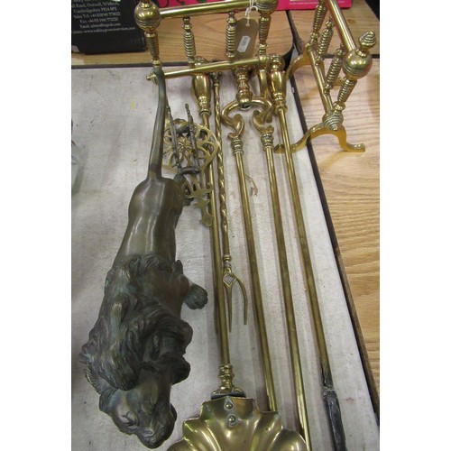 175 - Set of three brass fire irons with turned finials L68cm, a pair of early 19th C brass fire implement... 
