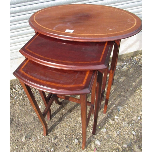 206 - Nest of three Edwardian inlaid mahogany oval occasional tables on square tapered supports, W64cm D40... 