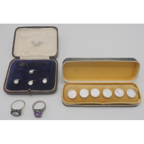 367 - Two silver dress rings, a set of Mother of Pearl buttons and a part set of similar dress studs, both... 