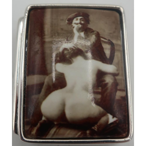 347 - Silver and enamel pill box depicting erotic scene, stamped Sterling