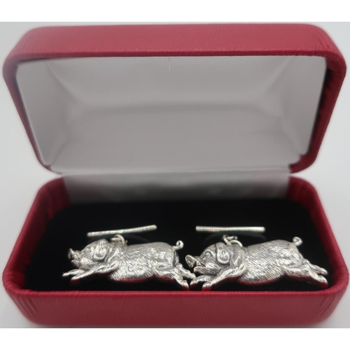 353 - Pair of silver flying pig cufflinks, stamped Sterling