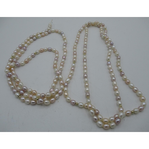 158 - Two single strings of coloured simulated pearls, L77cm