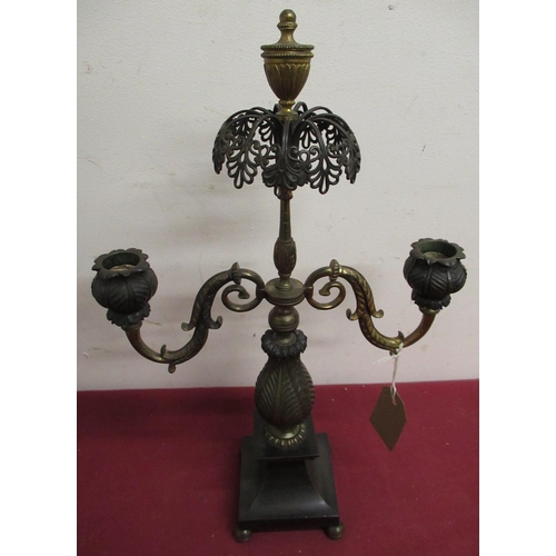 337 - Regency gilt bronze two branch candelabra with open work cresting and urn finial on tapering base wi... 