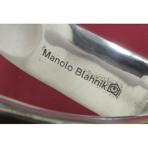 344 - Manolo Blahnik brushed metal shoe horn in the form of a high healed shoe L17cm H20cm