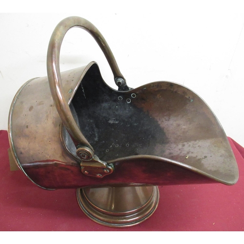 345 - Early 20th C copper coal helmet with swing handle on stepped tapering base stepped, stamped with cro... 