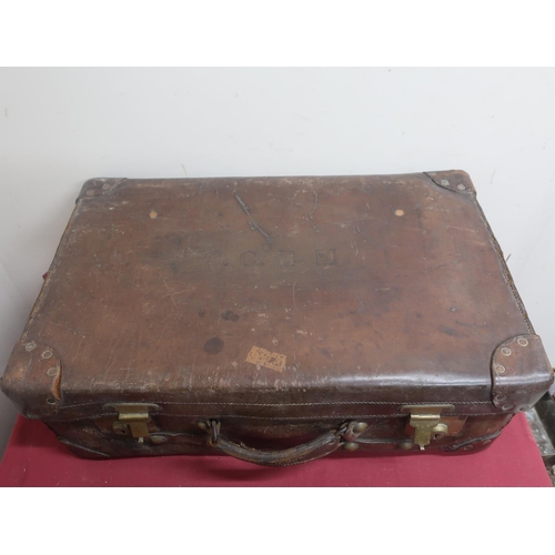 497 - Early 20th C brown leather suitcase with reinforced corners, early 20th C golfing umbrella with bamb... 