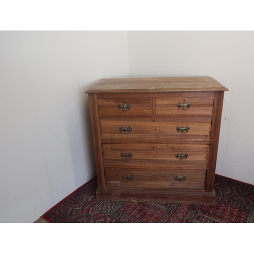 433 - Edwardian walnut chest of two short and three long drawers on a skirted base W103cm D50cm H101cm