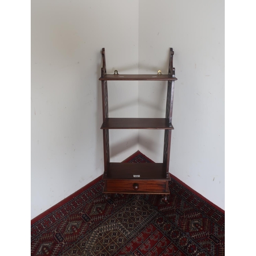 434 - George III style hardwood three tier wall shelf, with fretwork sides above a single drawer on scroll... 