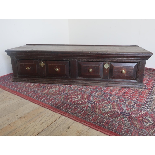 437 - Small 18th C oak dresser, with molded top and two twin drawers (lacking legs) W130cm D46cm H31cm