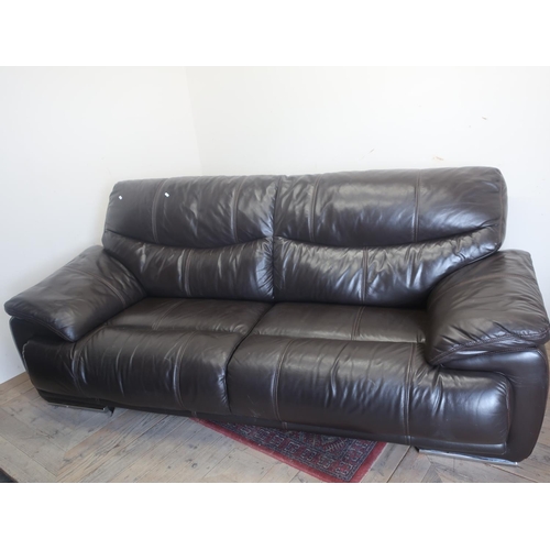 455 - Faux leather contemporary two seat sofa with zip of cushion and similar arm chair on chrome feet L21... 