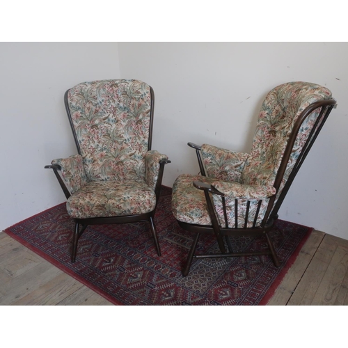 534 - Pair of Ercol armchairs on stretcher bases