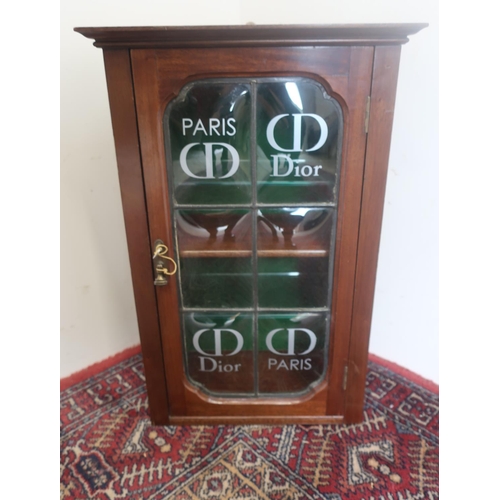 540 - Small wall cupboard, lead glazed convex door with CD Dior Paris decals W36cm D20cm H54cm