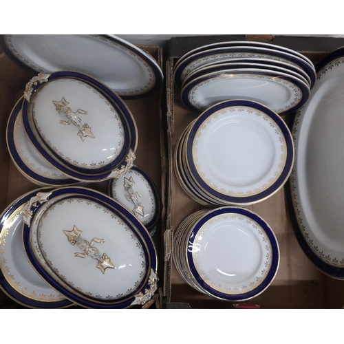 426 - Comprehensive Victorian dinner service decorated with gilt within a blue border, including two veget... 