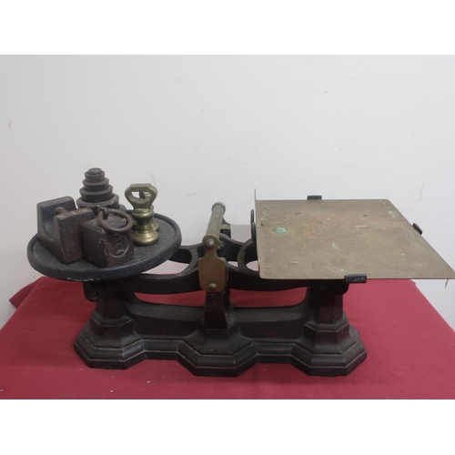 485 - Early 20th C cast iron and brass grocery scales, brass carrying handle and tray