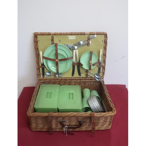 516 - 1960s Coracle picnic set in wicker basket and a later picnic set