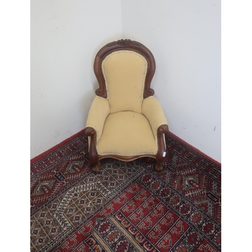 555 - Miniature Victorian style upholstered arm chair with floral carved crested rail and cabriole legs H5... 