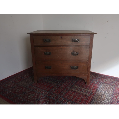537 - Early 20th C oak chest of three long drawers, on square supports W92cm D48cm H80cm