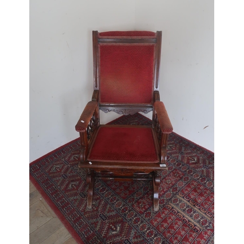 552 - Late Victorian walnut rocking chair upholstered back seat and arms pads