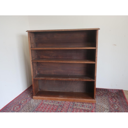 553 - Early 20th C oak open bookcase with one fixed and two adjustable shelves and plinth base W111cm D25C... 