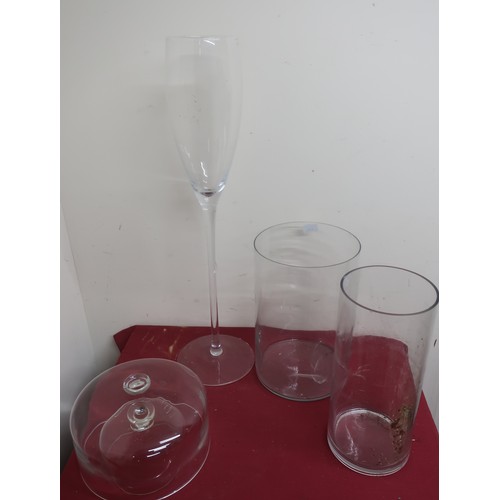 498 - A glass vase in the form of a stemmed wine glass, two plain glass vases and two glass cheese domes (... 