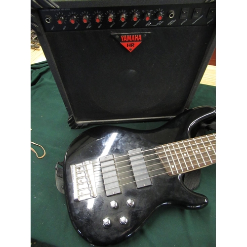 101 - Black unbranded six string electric bass guitar with active pick-ups in soft Armourdillo banjo case,... 