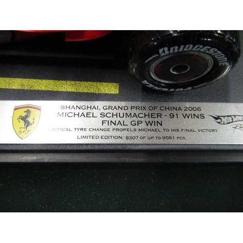 205 - HotWheels 1:18 scale Michael Schumacher Ferrari racing car, celebrating his 91st and final Grand-Pri... 