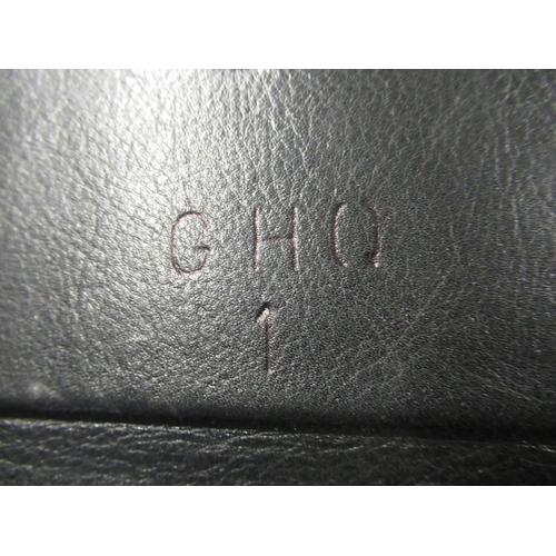 117 - Military style attaché case with buckle fastening, stamped to the interior GHQ1 with lock by Mitchel... 