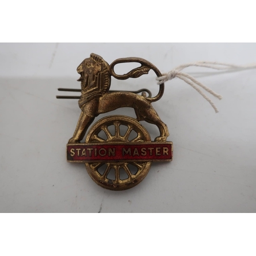 175 - BR brass and red enamel Station Master cap badge