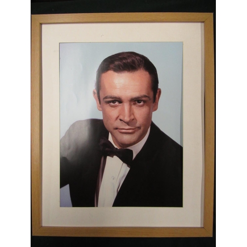 210 - Framed and mounted photograph of Sean Connery as James Bond, 54cm x 44cm, and a film poster for Dr N... 