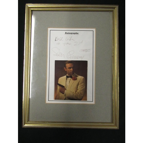 207 - Framed and mounted photograph of Sean Connery as James Bond, signed by Sean Connery, inscribed 'Best... 