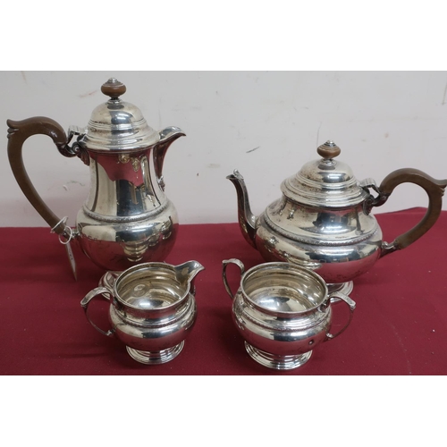 127 - Geo.V silver hallmarked four piece tea service, baluster bodies with with stepped bases and covers, ... 