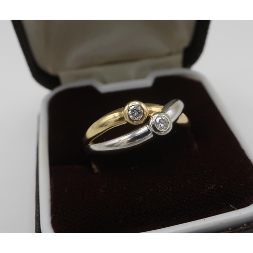 276 - 18ct two coloured gold, hallmarked, two stone diamond crossover ring, size M/N