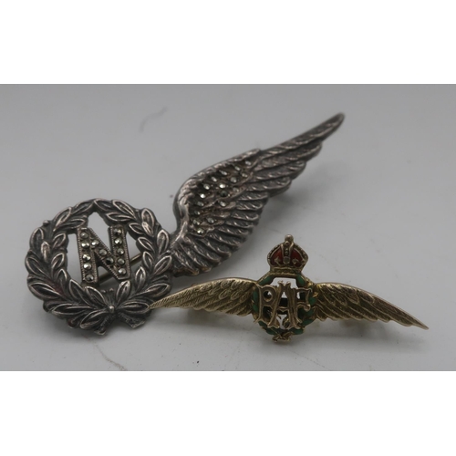 307 - Gold RAF Wings brooch, stamped 9ct, L3cm and a hallmarked silver and marcasite RAF Navigator brevet ... 