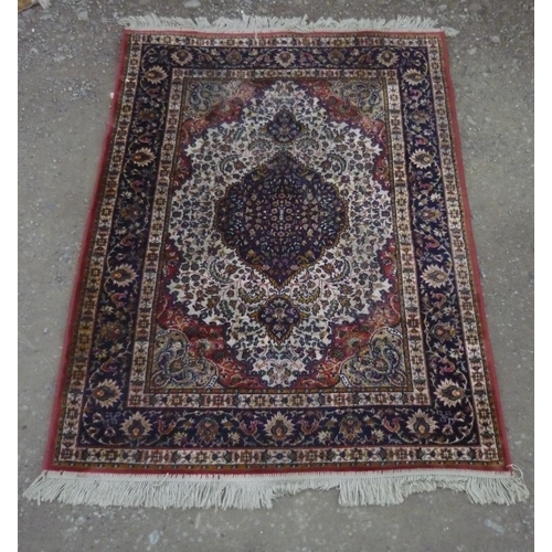 115 - Silk style rug with central medallion and blue ground floral patterned border, 100cm x 150cm